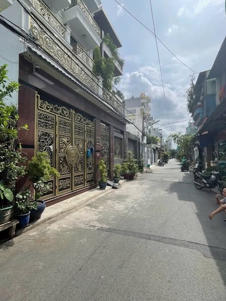 NHÀ 4 TẦNG – 6PN – HẺM XE HƠI THÔNG