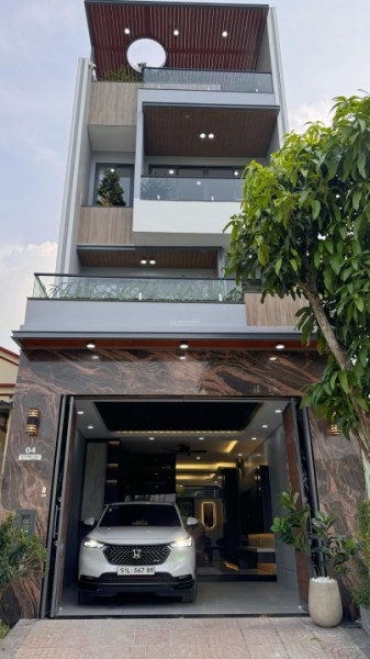 Nhà đường nhựa 16m vị trí đẹp view thoáng có thang máy Gara ô tô ngang 5m dài 18m